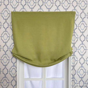 Close-up of green relaxed Roman shade in custom fit, showcasing its smooth fabric and tailored design. Anvige Style 751 ZY.