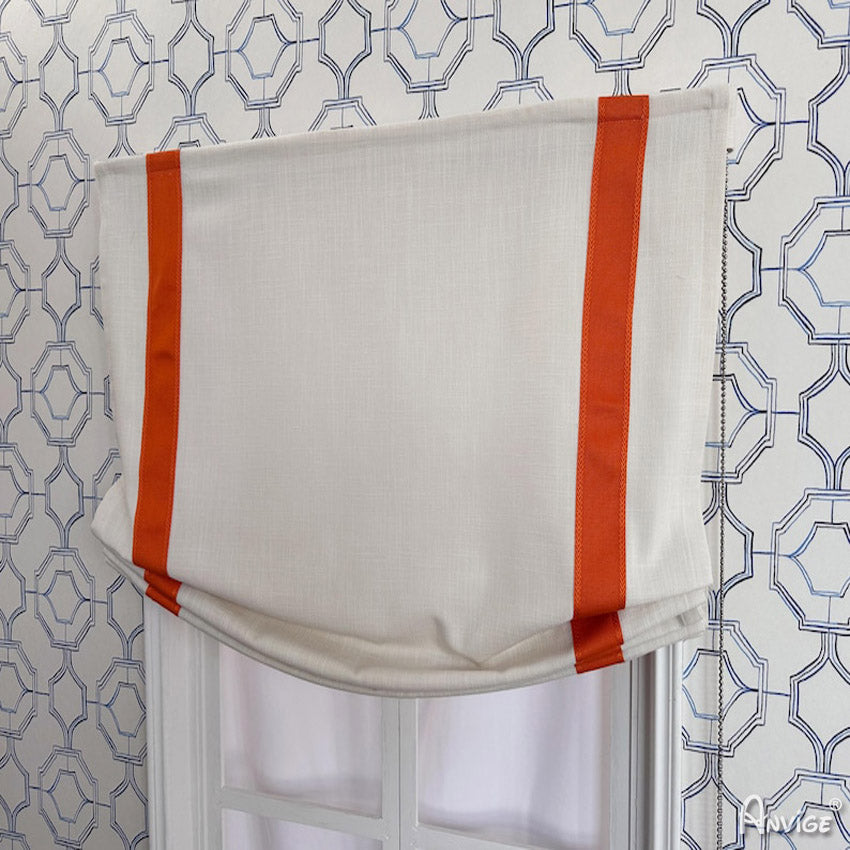 Custom Relax Roman Shades with orange accents, shown partially folded on a window. Includes hardware for easy installation and light-filtering options.