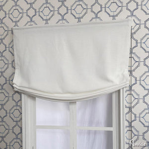 Custom Relax Roman Shades in white fabric, partially drawn, offering a stylish and functional light-filtering window treatment.